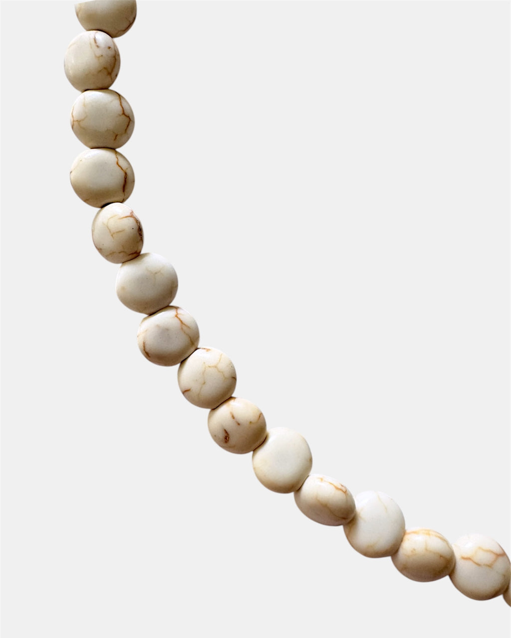 Beige necklace featuring turquoise stones for a natural, earthy style