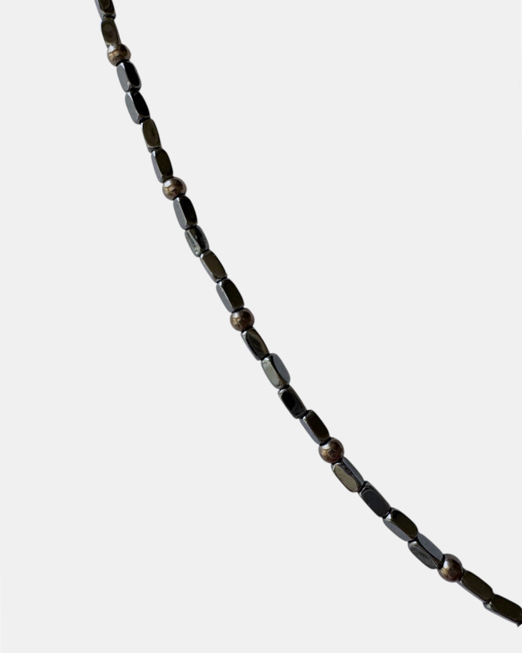Black necklace with a horn pendant