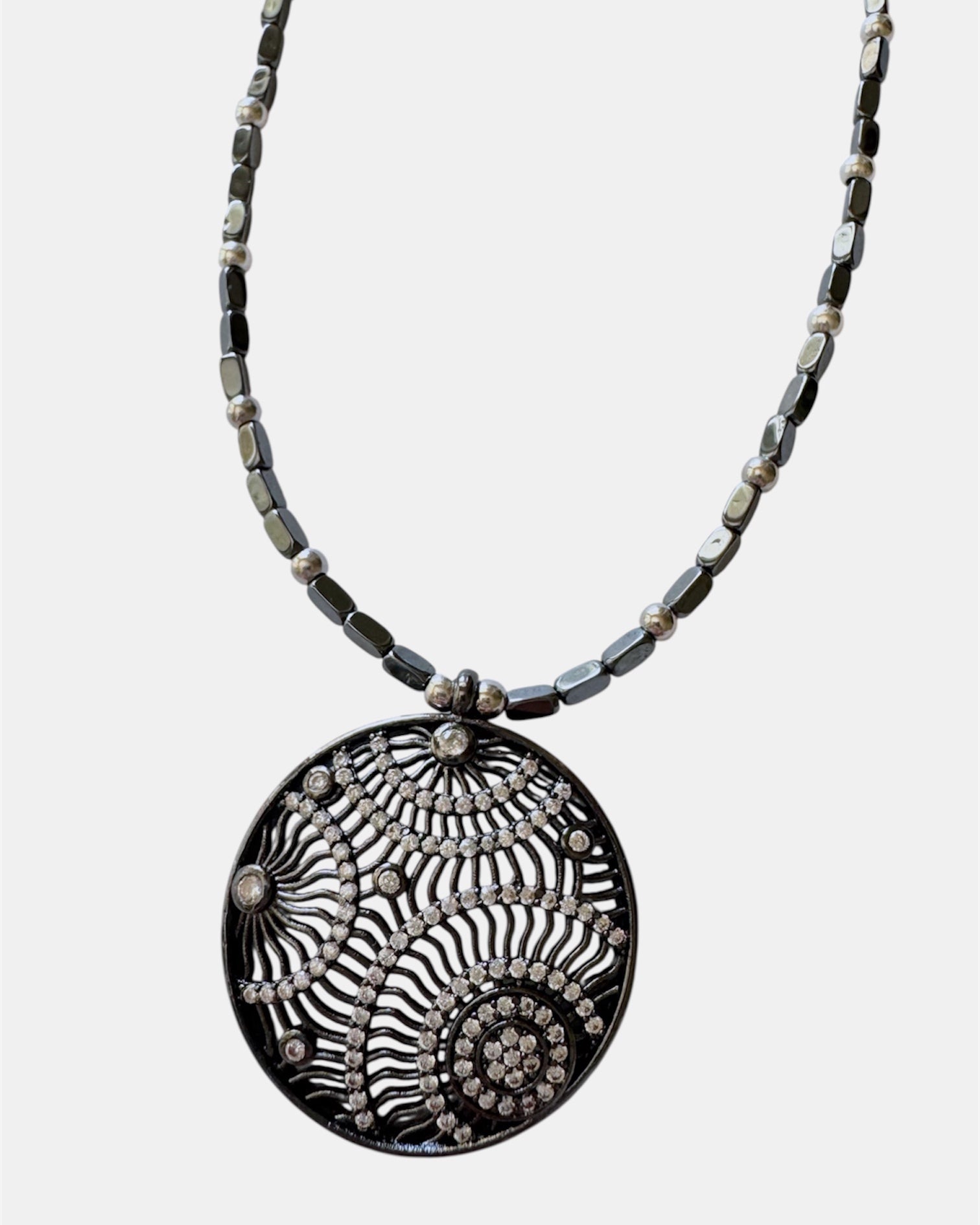 black necklace with round pendant, elegant jewelry piece for women and girls