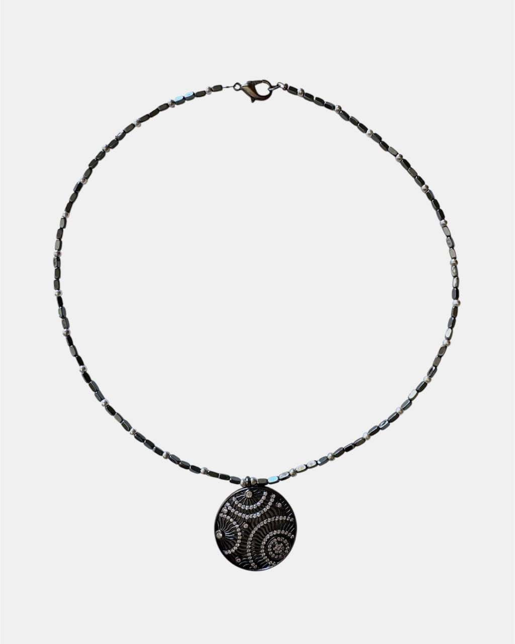 black necklace with round pendant, elegant jewelry piece for women and girls