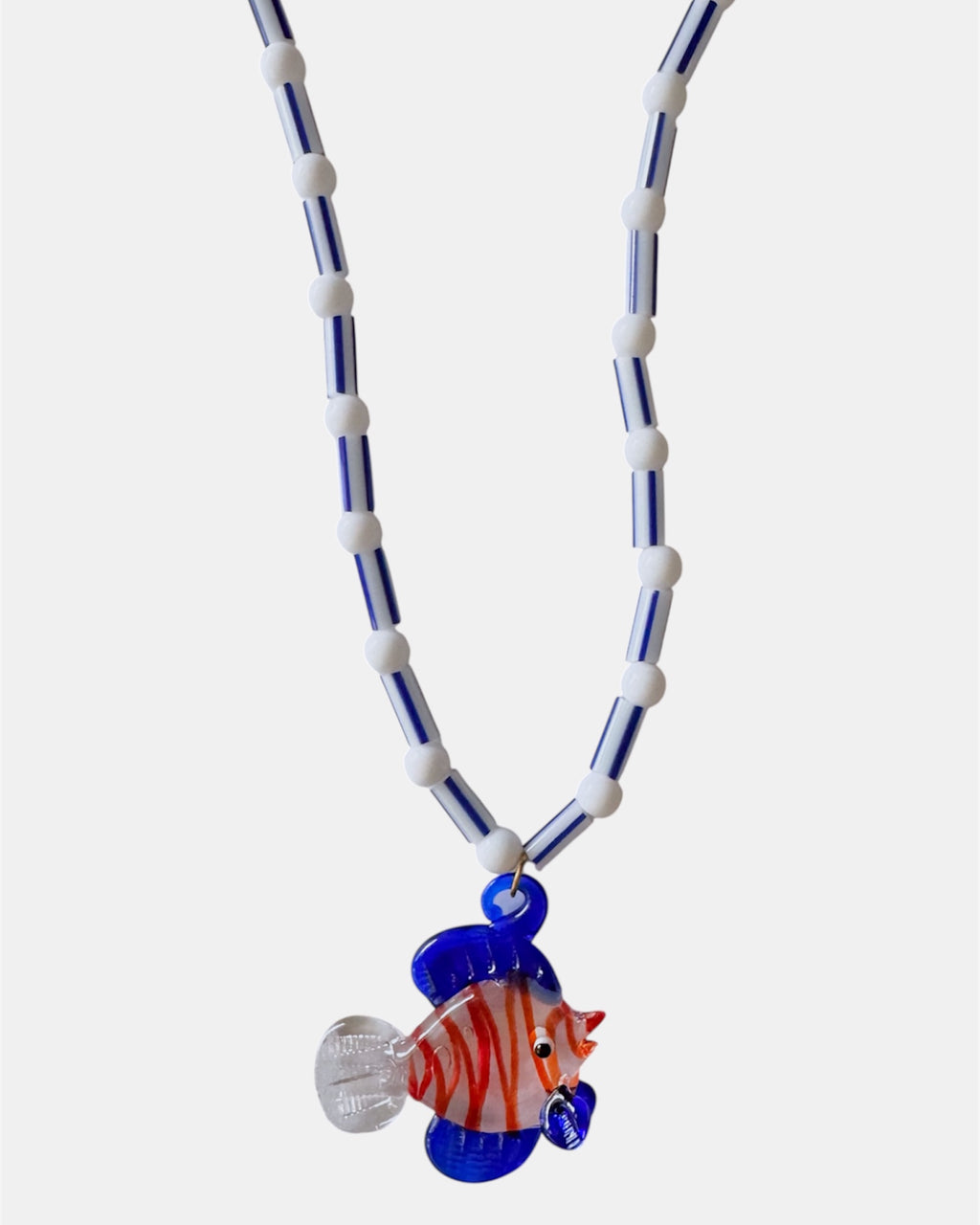 blue and white necklace with glass beads and fish charm, handmade jewelry piece for women and girls