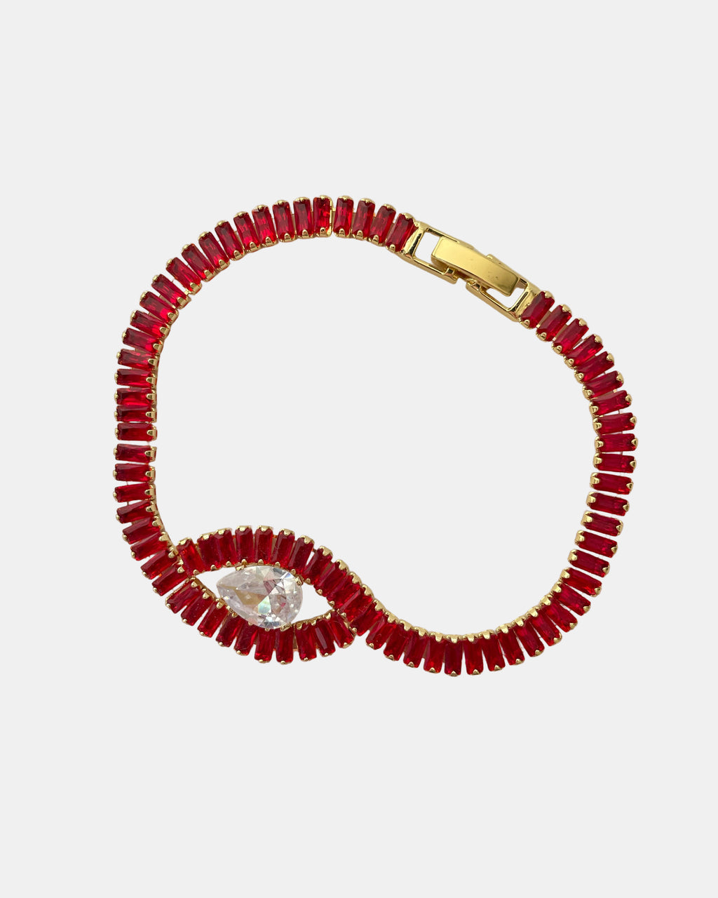 Χρυσό βραχιόλι με ζιργκόν και κεντρικό κόκκινο στοιχείο σε σχήμα ματιού.