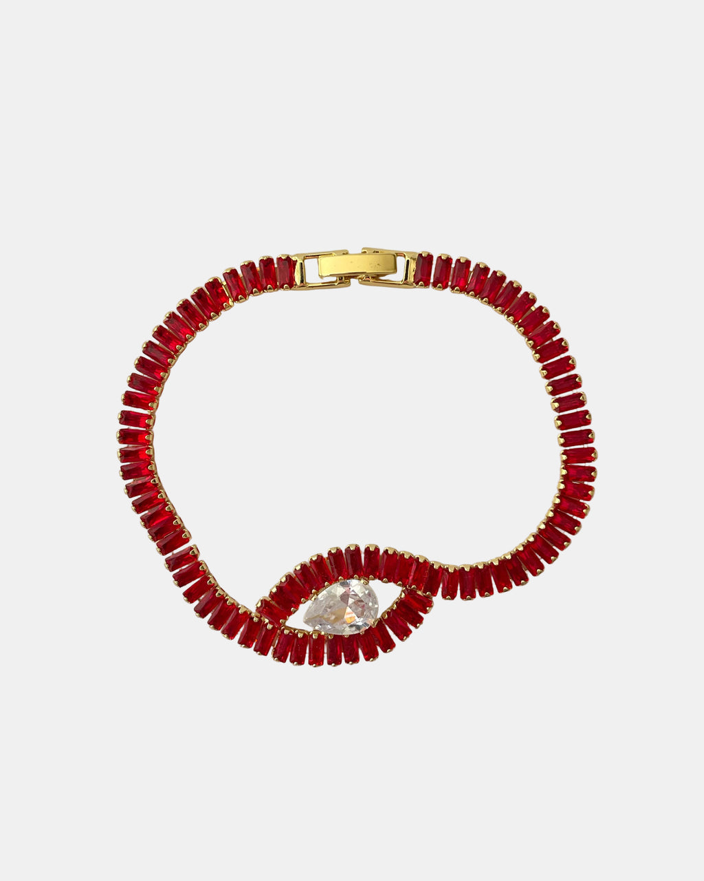 Χρυσό βραχιόλι με ζιργκόν και κεντρικό κόκκινο στοιχείο σε σχήμα ματιού.