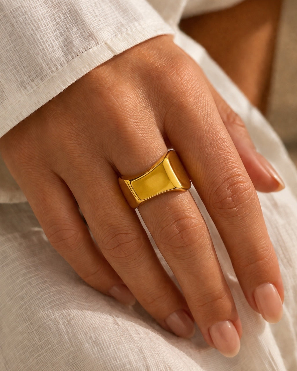 Gold ring with geometric line design