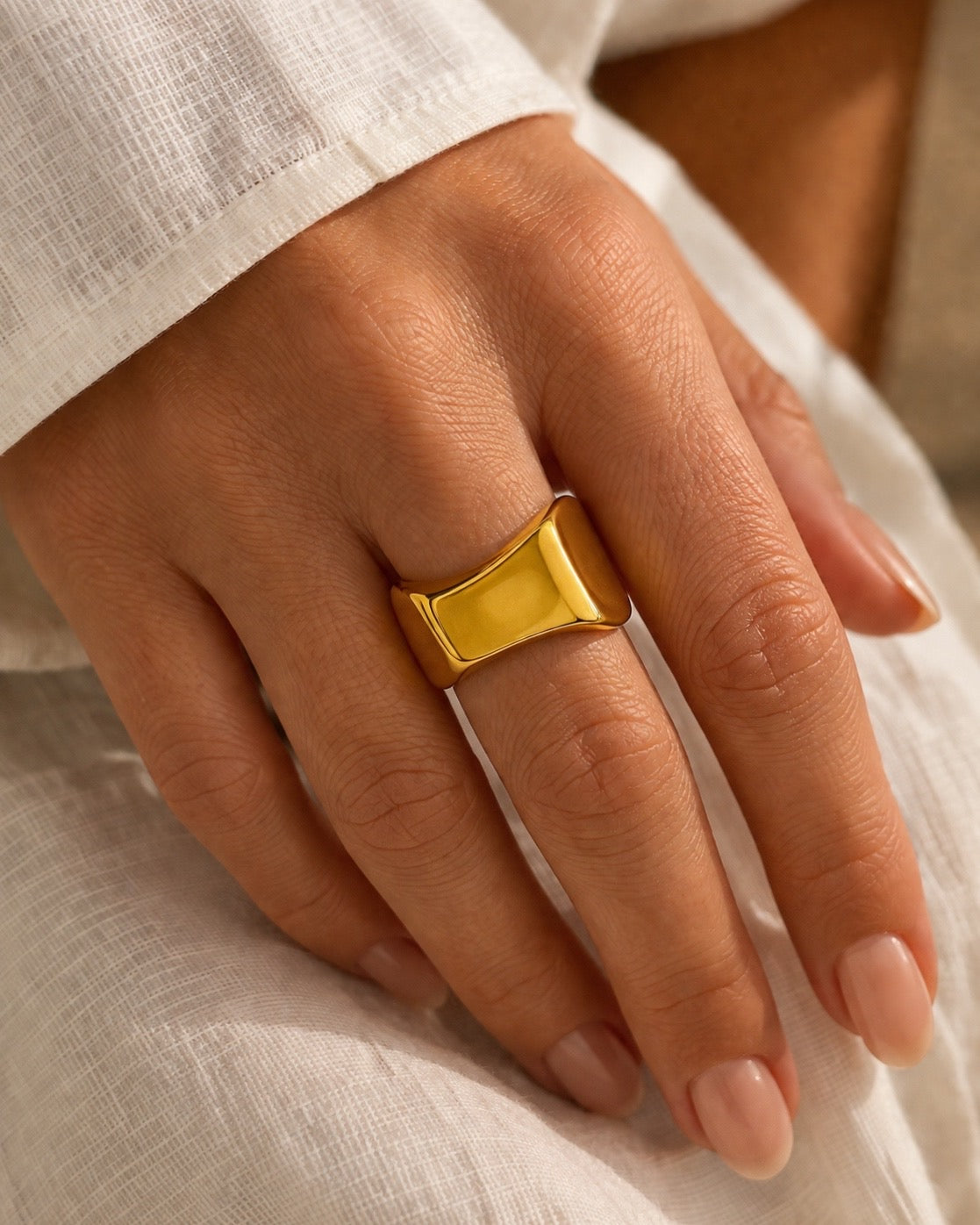 Gold ring with geometric line design