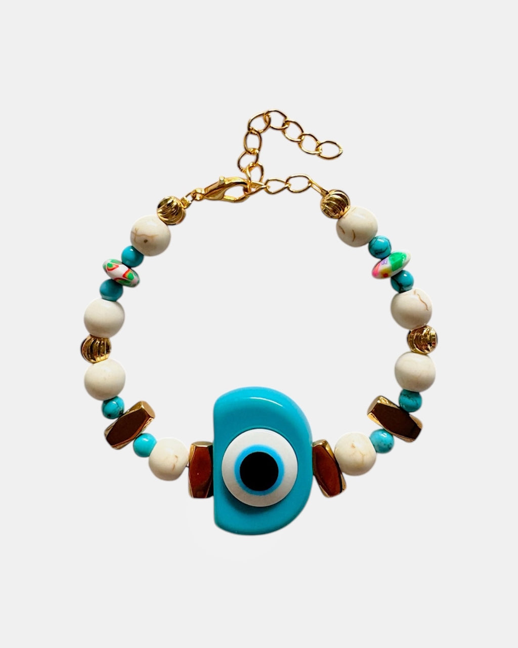 Gold bracelet with turquoise eye and ecru beads