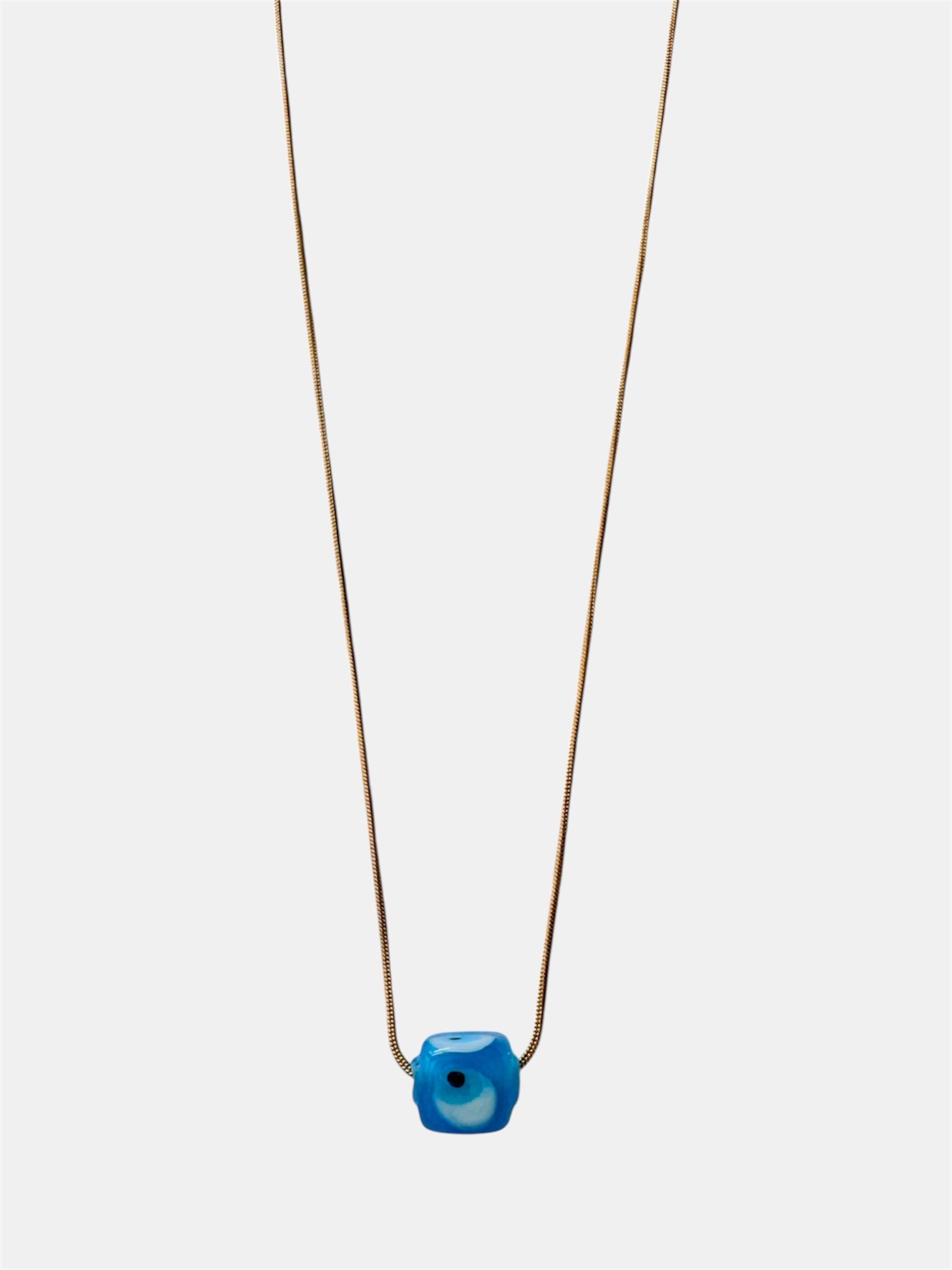 Gold chain necklace with a blue glass evil eye charm