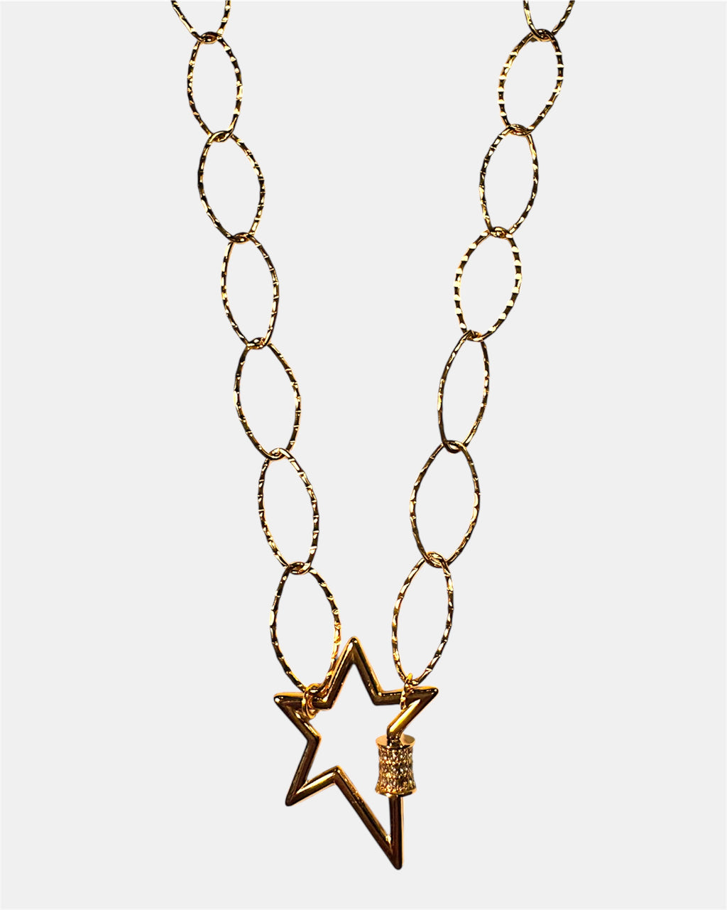 Gold chain necklace with a star charm