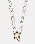 Gold chain necklace with a star charm