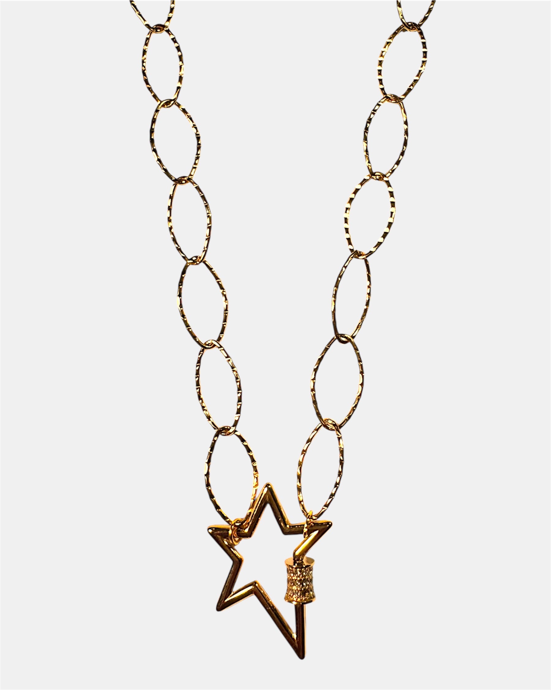 Gold chain necklace with a star charm