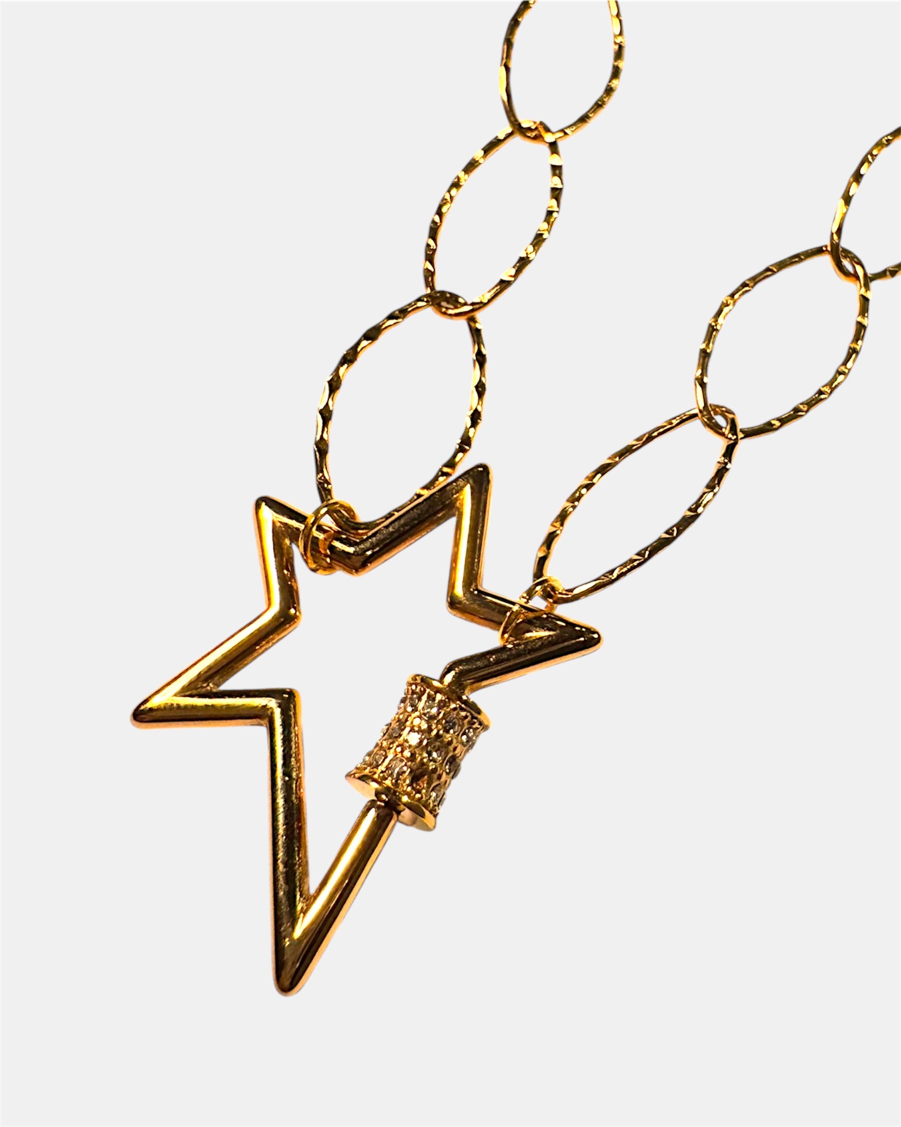 Gold chain necklace with a star charm