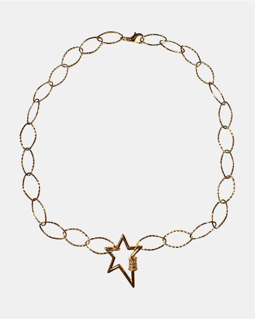 Gold chain necklace with a star charm
