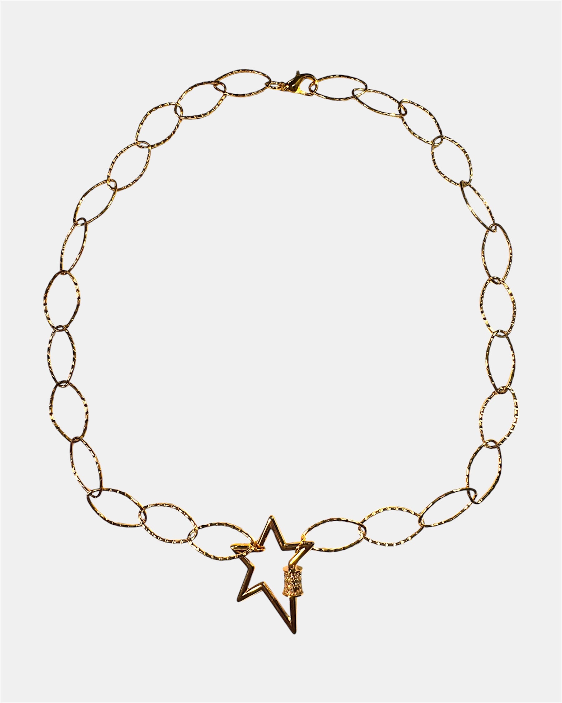 Gold chain necklace with a star charm