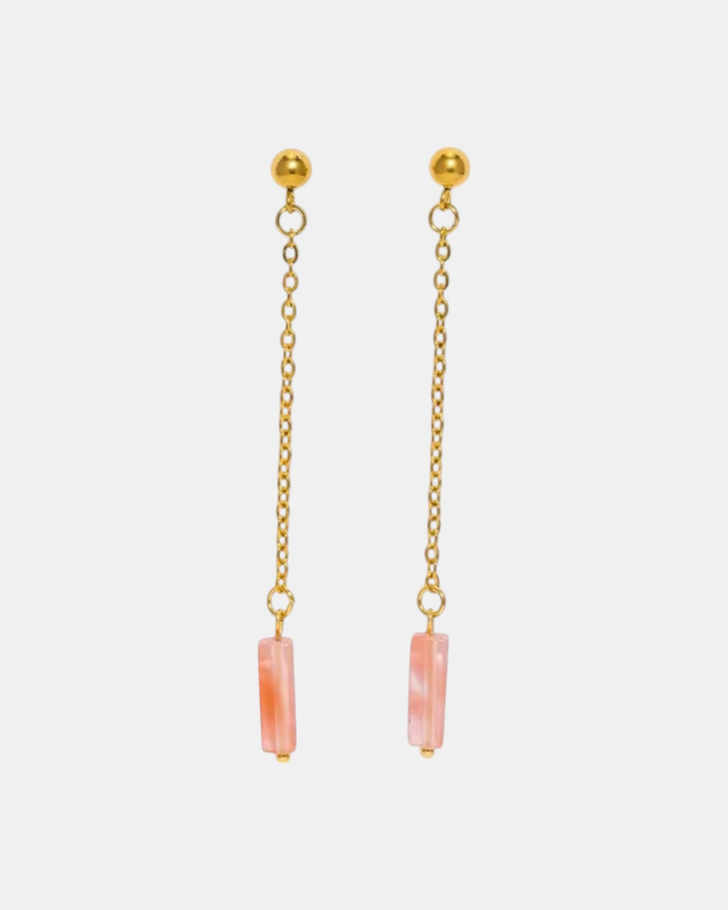 Gold dangle earrings with a pink stone