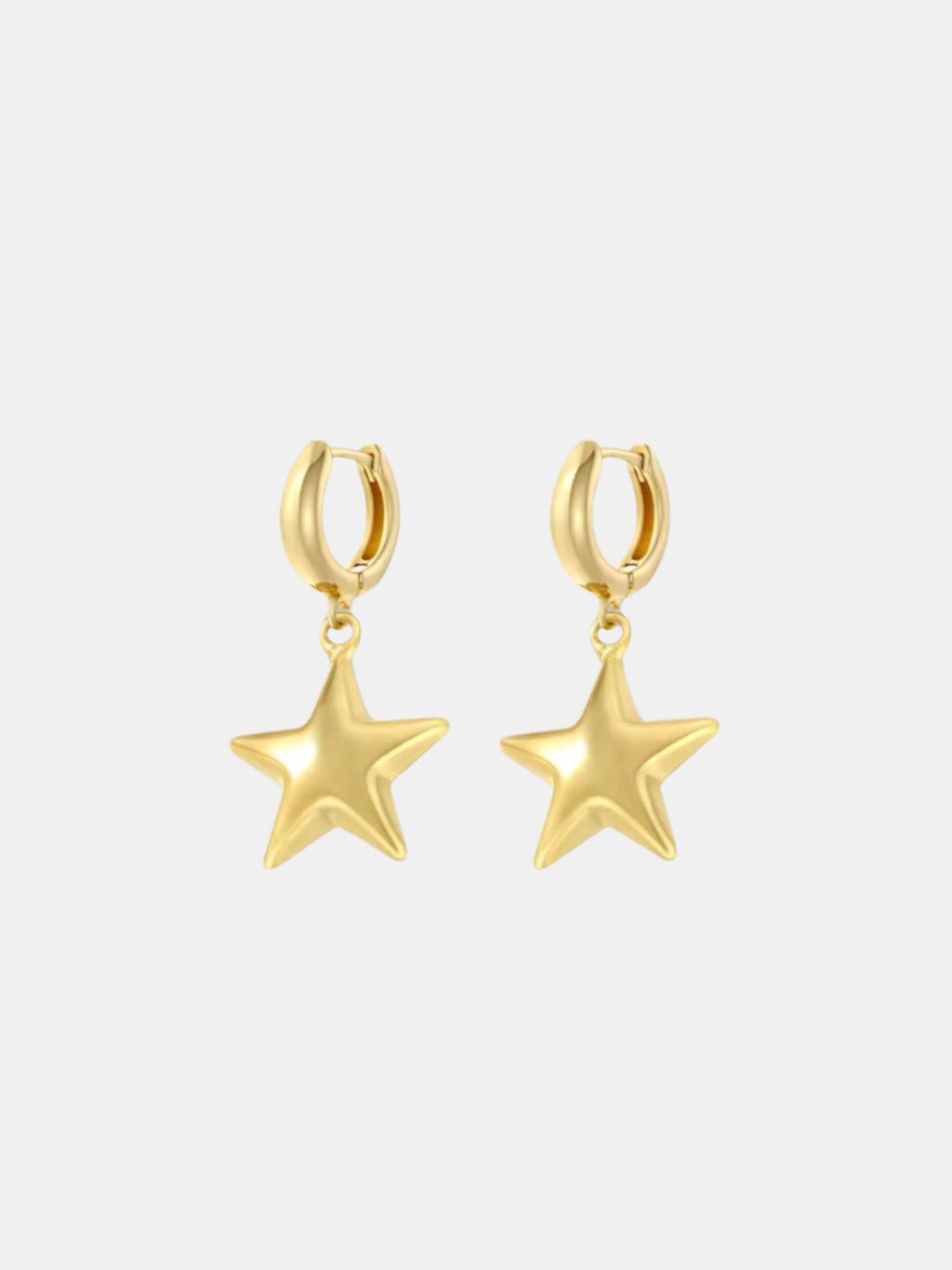 Gold dangle earrings with star design elegant jewelry accessory
