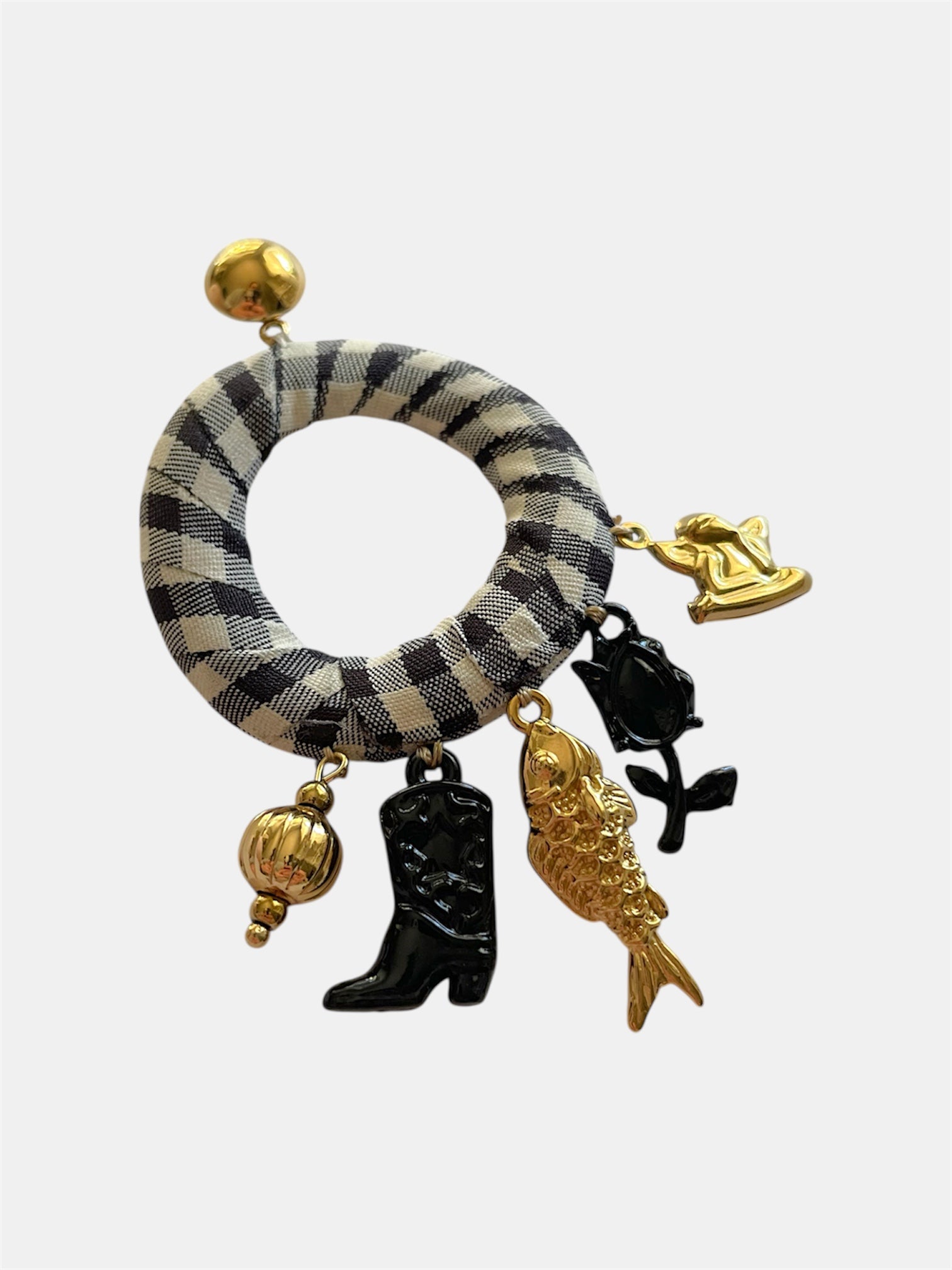 Gold dangling earrings with checkered hoop and charms.