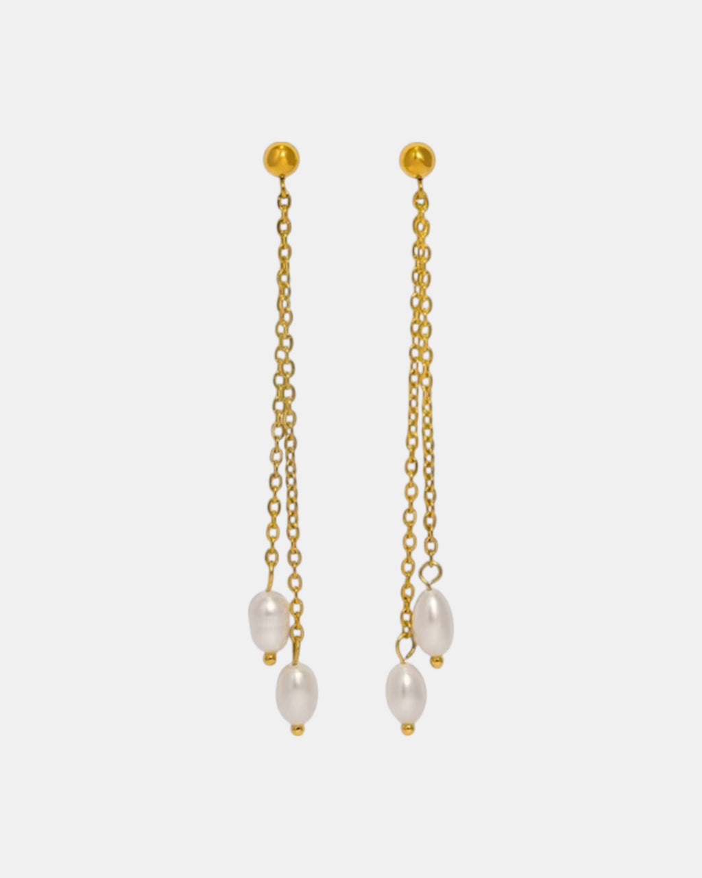 Gold dangling earrings with pearl.