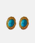 Gold earrings with turquoise stone.