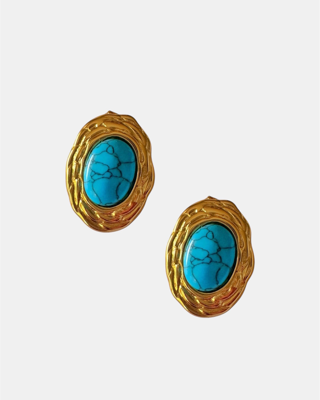 Gold earrings with turquoise stone.