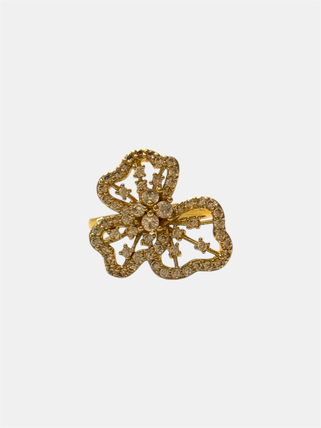 Gold flower ring with white zircon stones, elegant and feminine jewelry