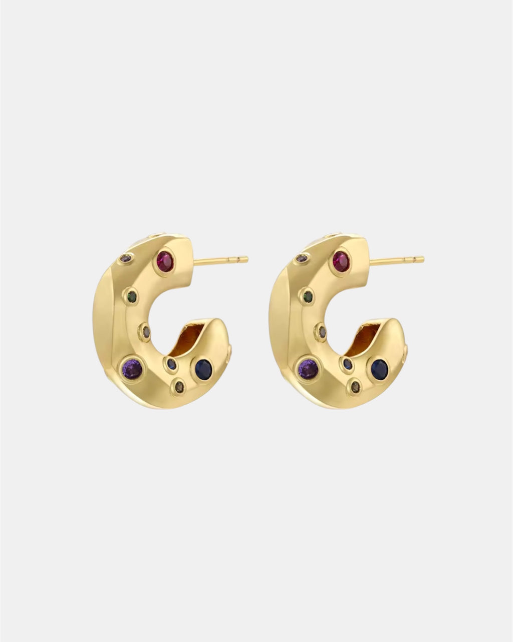 Gold hoop earrings with zircon stones.
