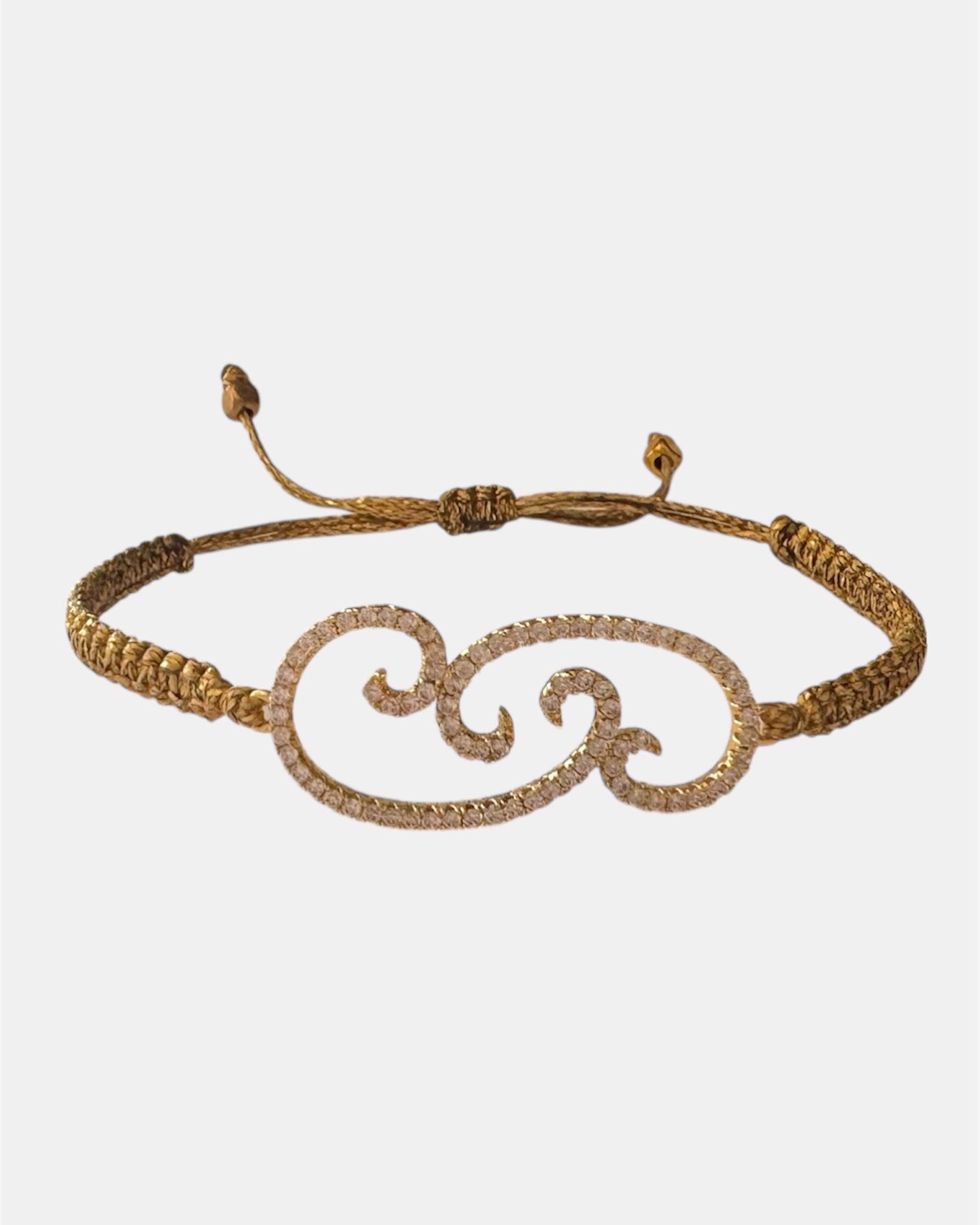 Gold macrame bracelet with flower charm
