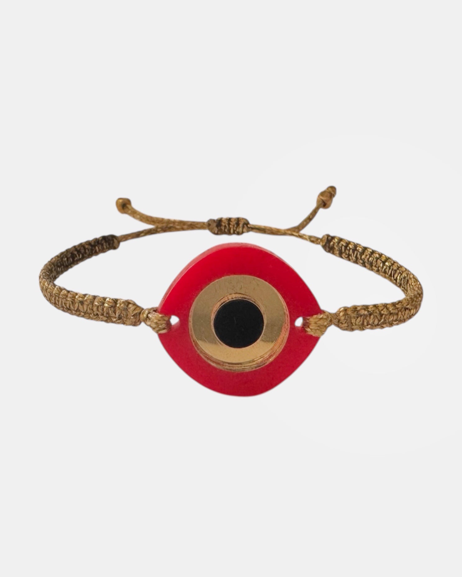 Gold macrame bracelet with plexiglass eye charm
