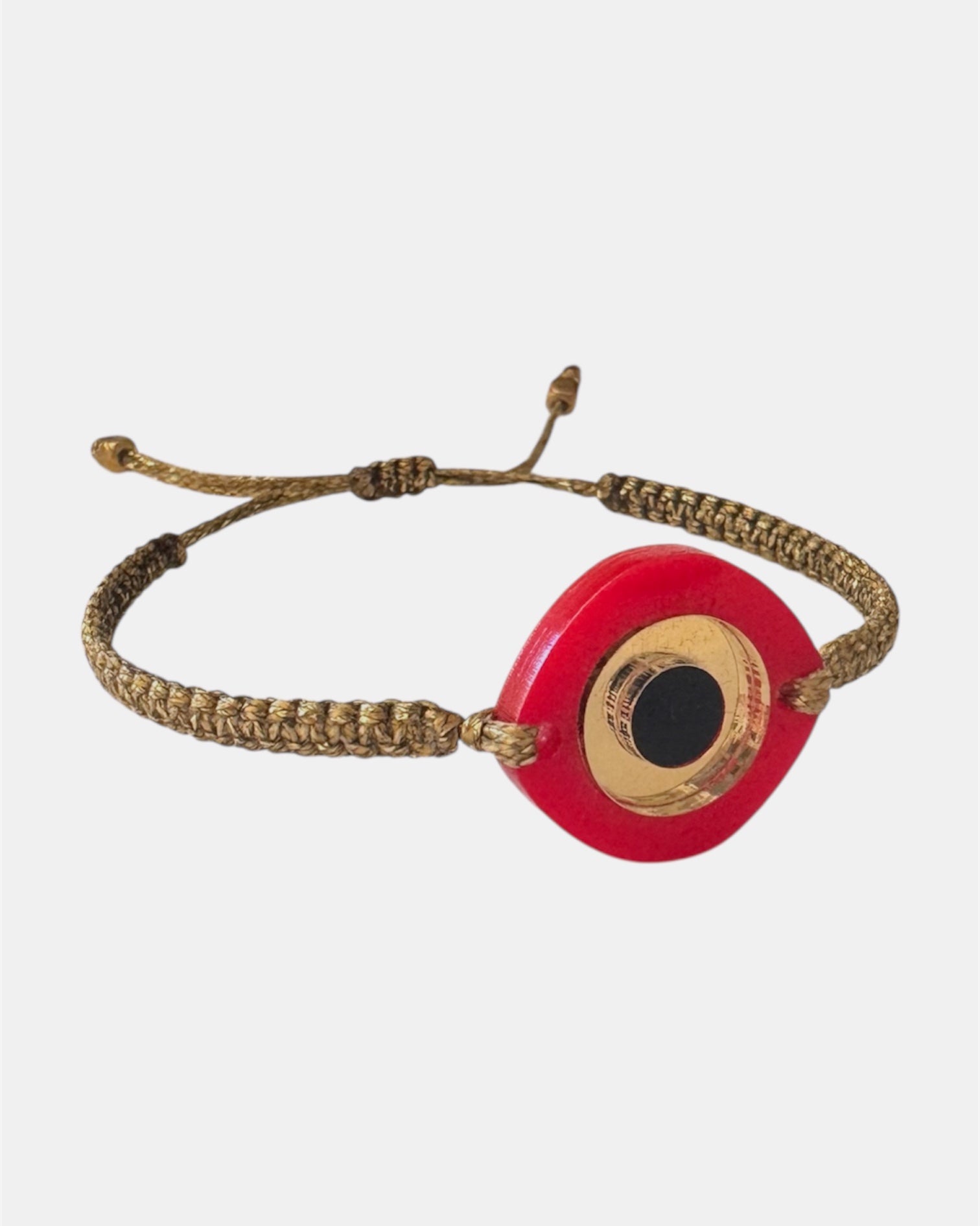 Gold macrame bracelet with plexiglass eye charm