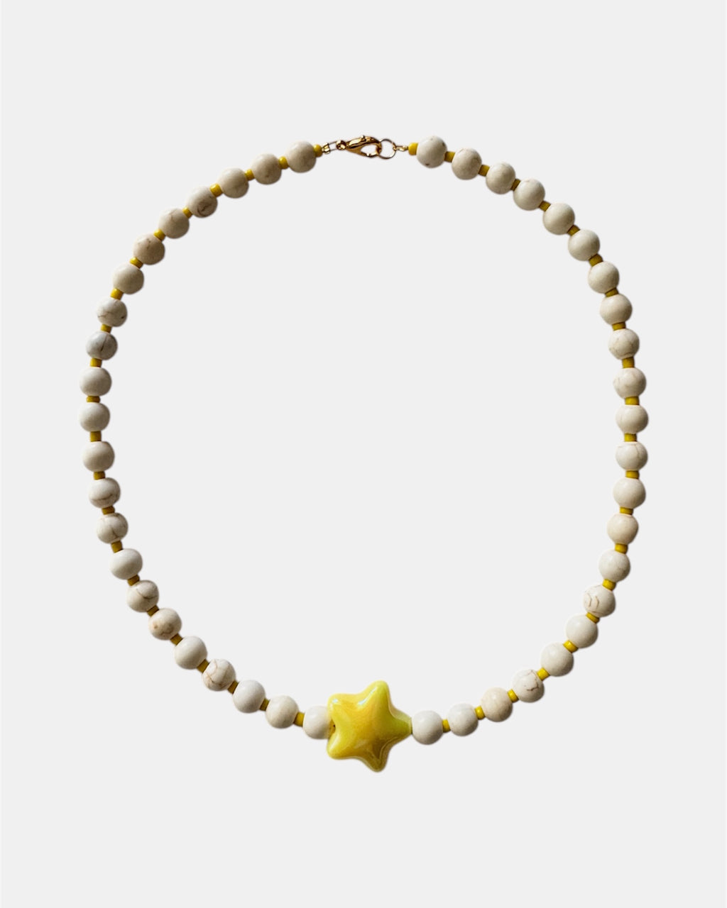 gold necklace with ecru beads and yellow ceramic star charm, elegant jewelry piece for women and girls