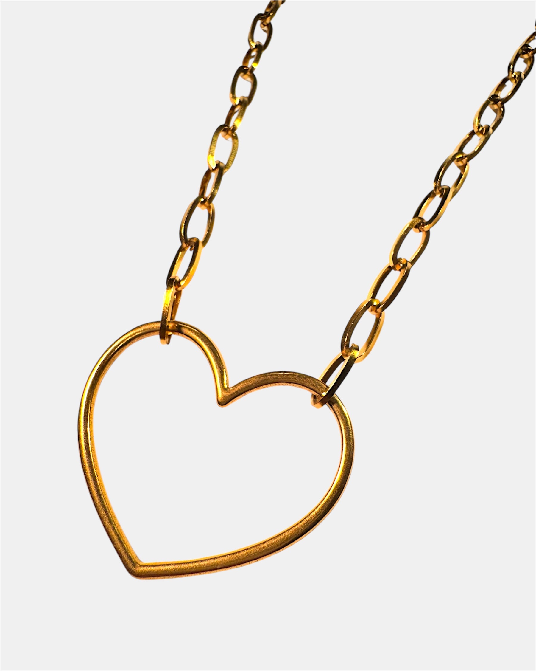 Gold necklace with a heart pendant