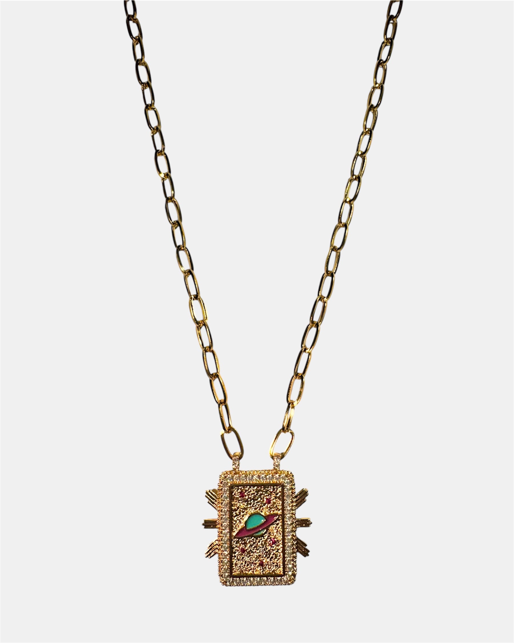 Gold necklace with a rectangular planet pendant