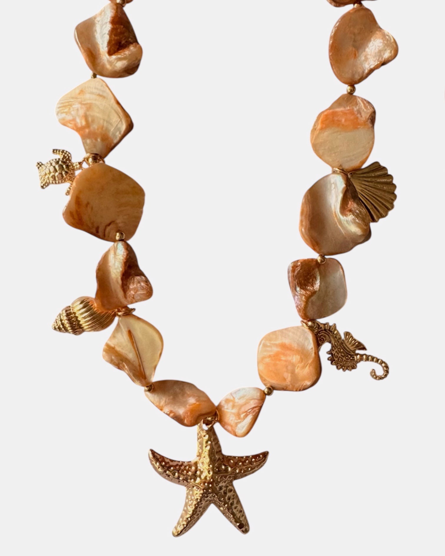 gold necklace with starfish charm, elegant jewelry piece for women and girls