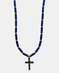 Necklace with blue beads and a cross pendant on a white background