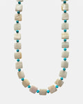 Necklace with white shell beads and turquoise beads on a white background