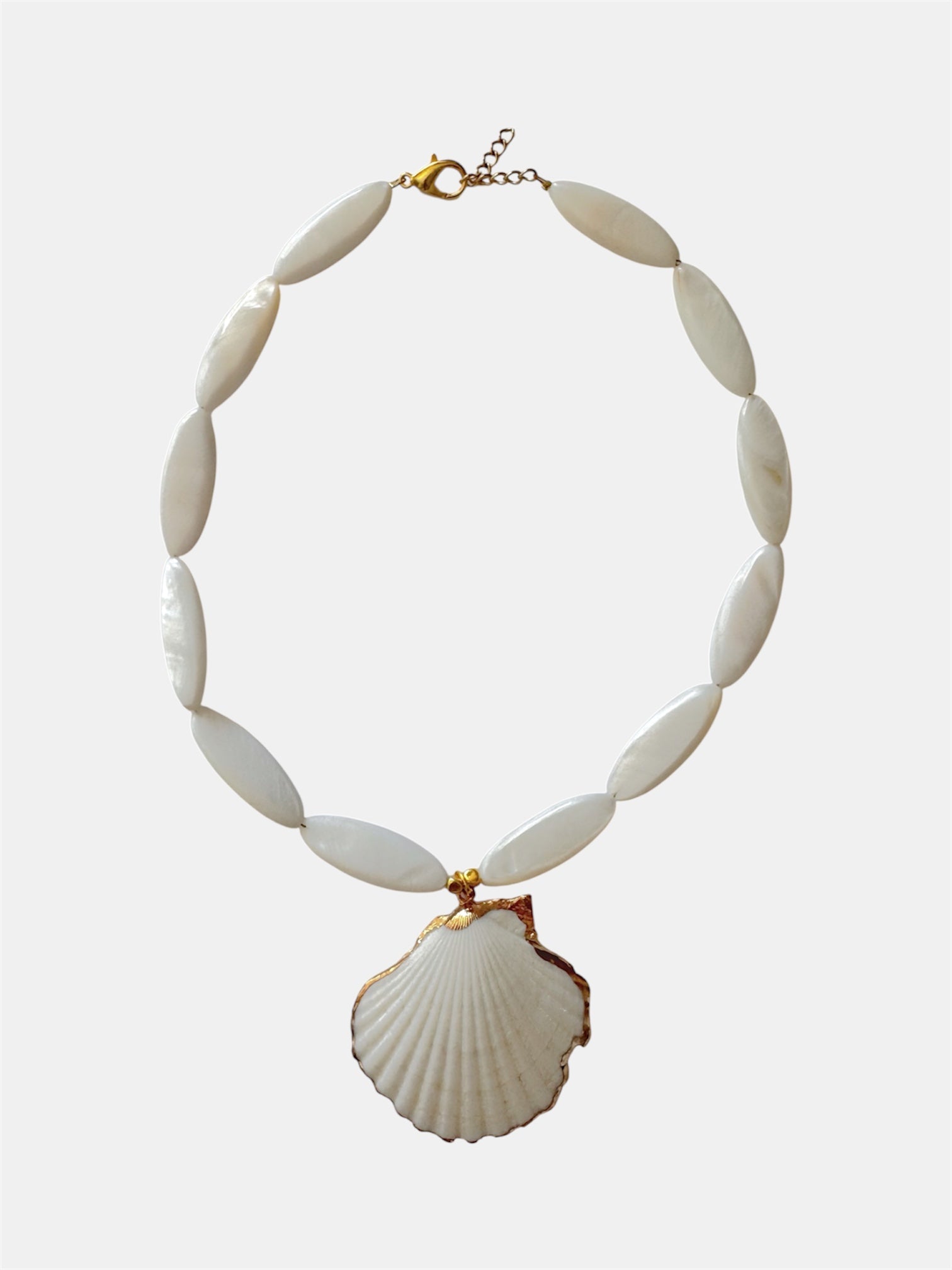 Gold necklace with ivory beads and natural shell