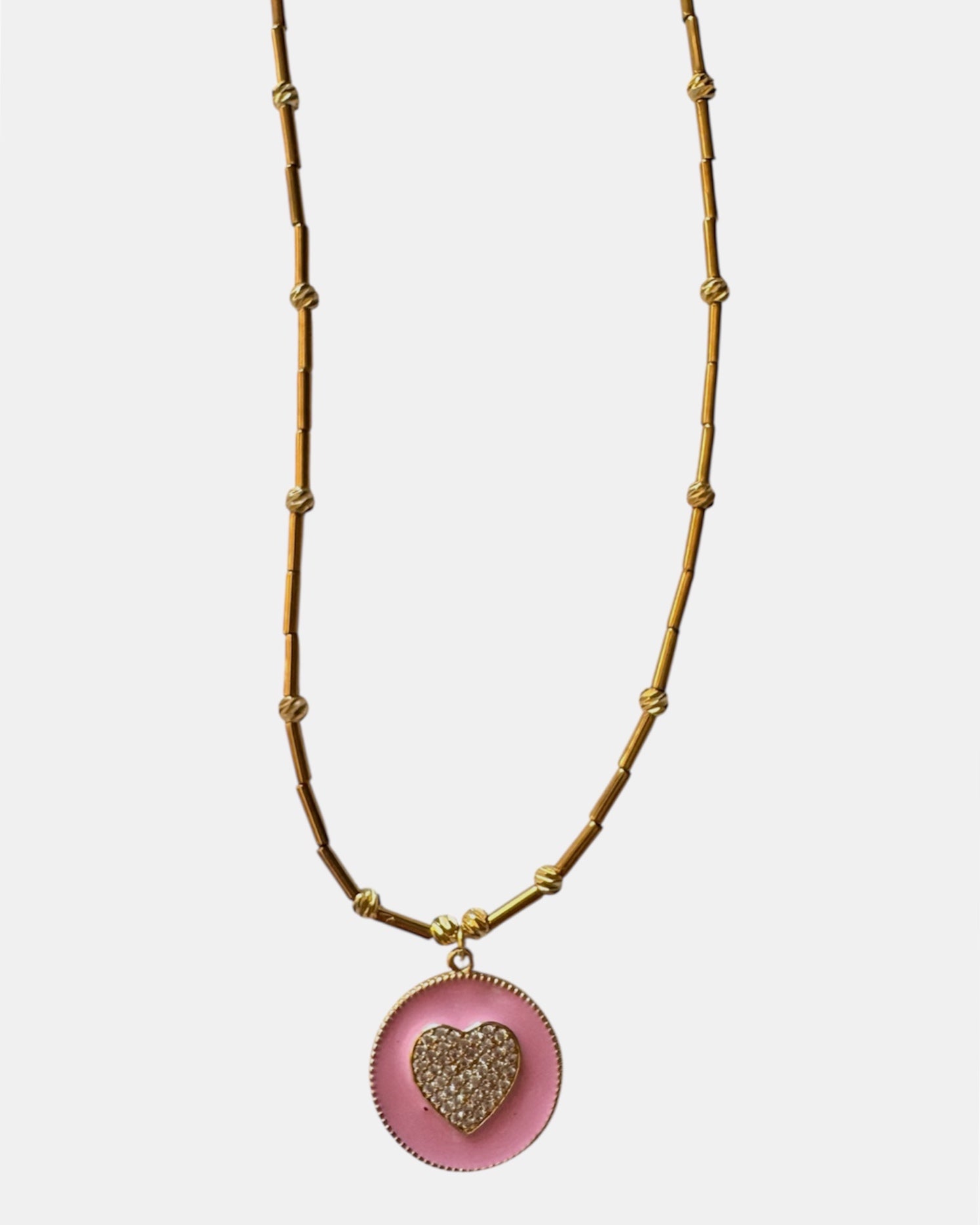 gold necklace with pink heart pendant, elegant jewelry piece for women and girls