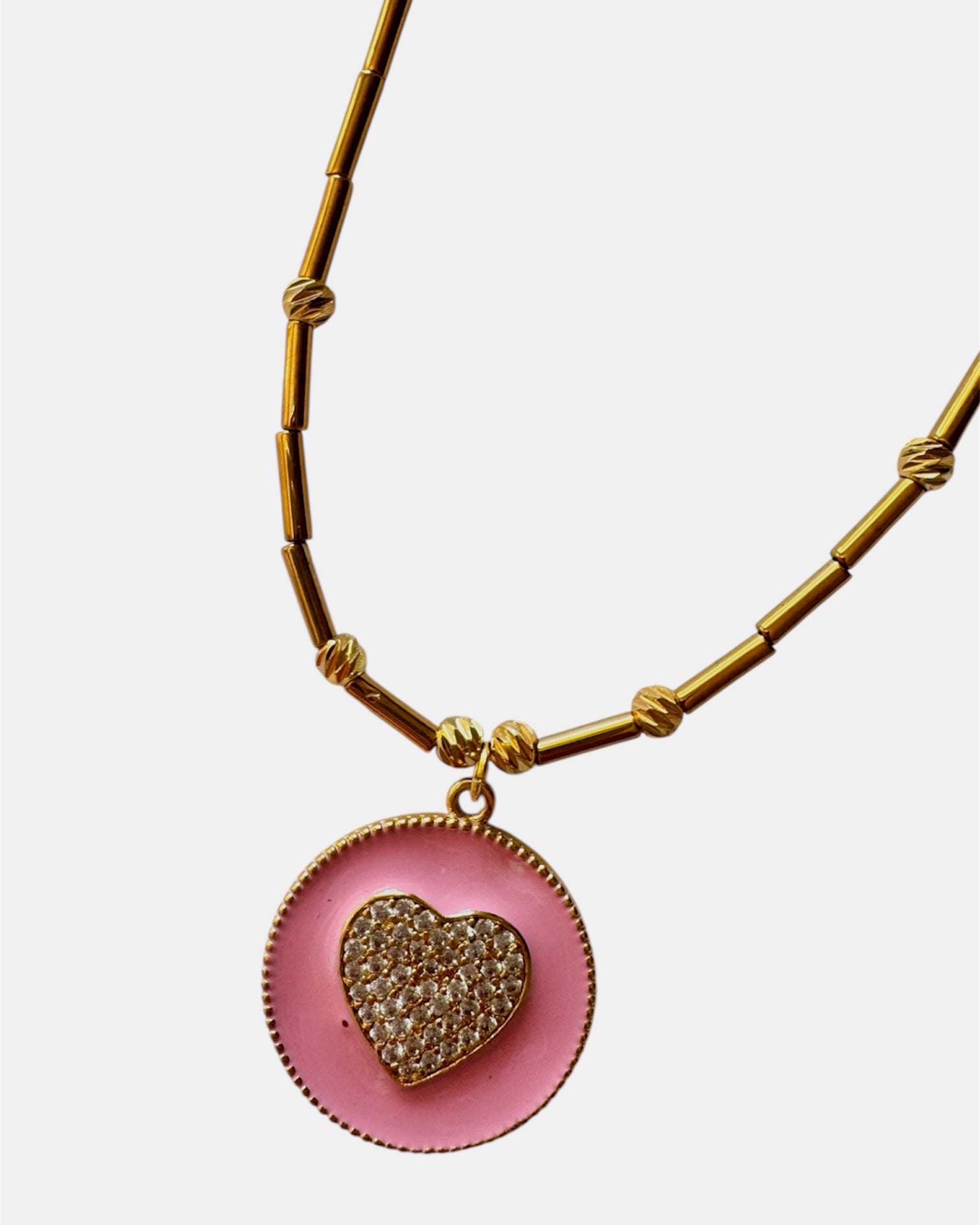 gold necklace with pink heart pendant, elegant jewelry piece for women and girls