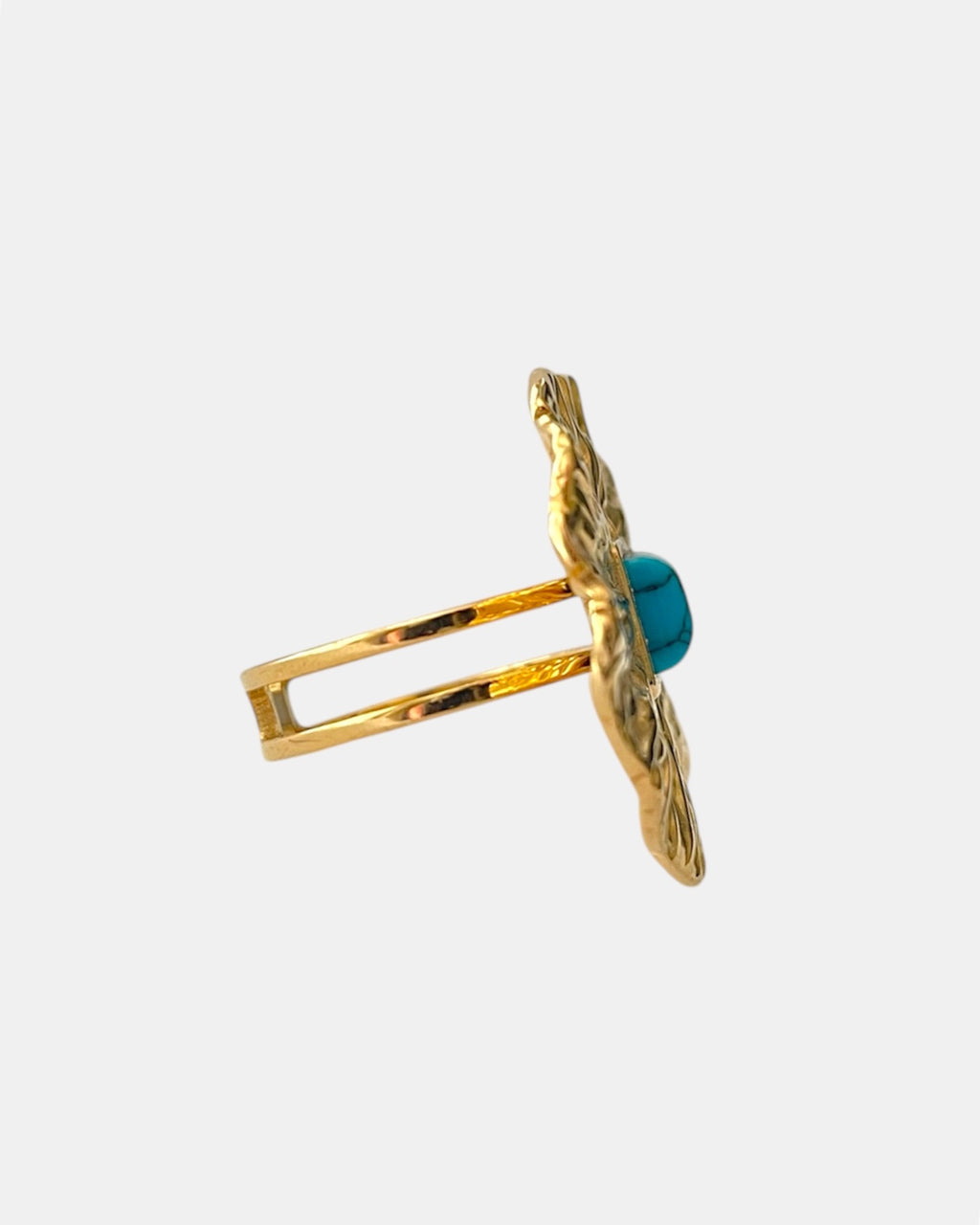Gold open ring with light blue stone elegant jewelry design