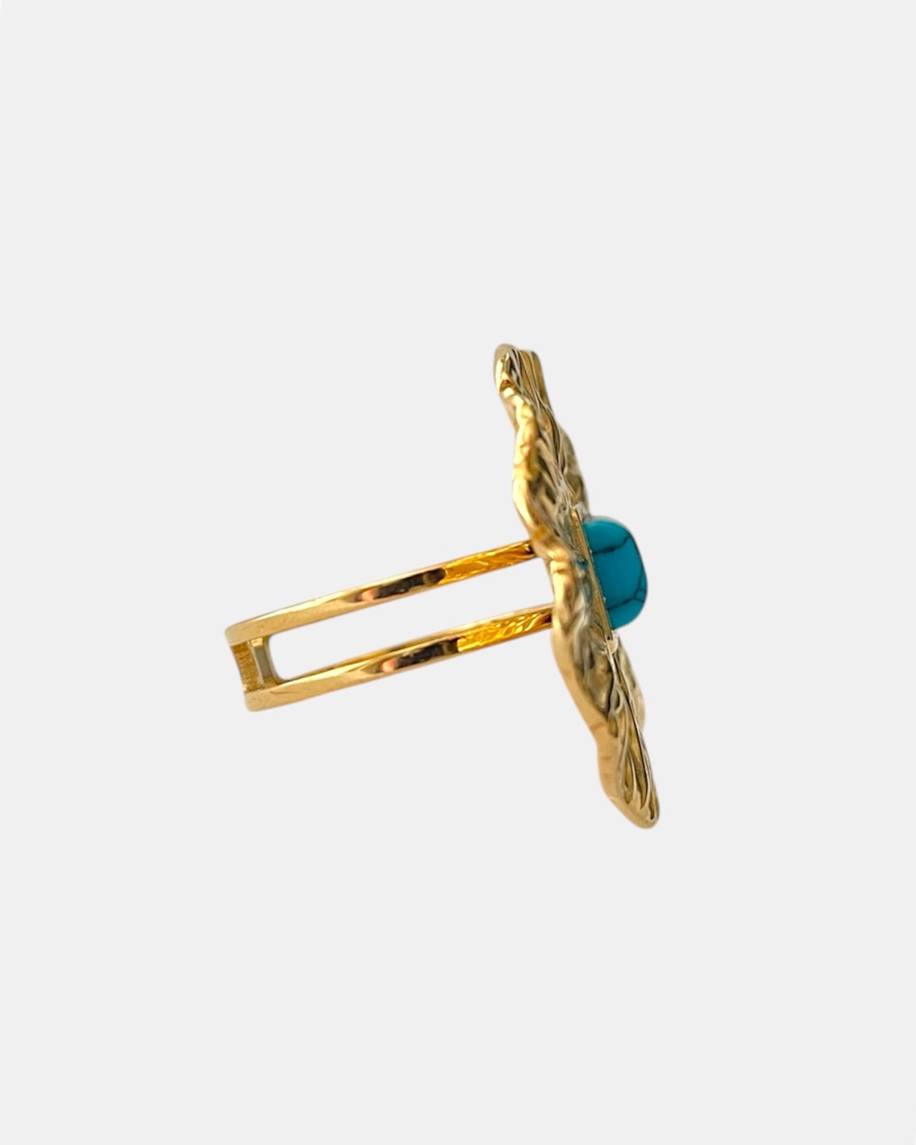 Gold open ring with light blue stone elegant jewelry design