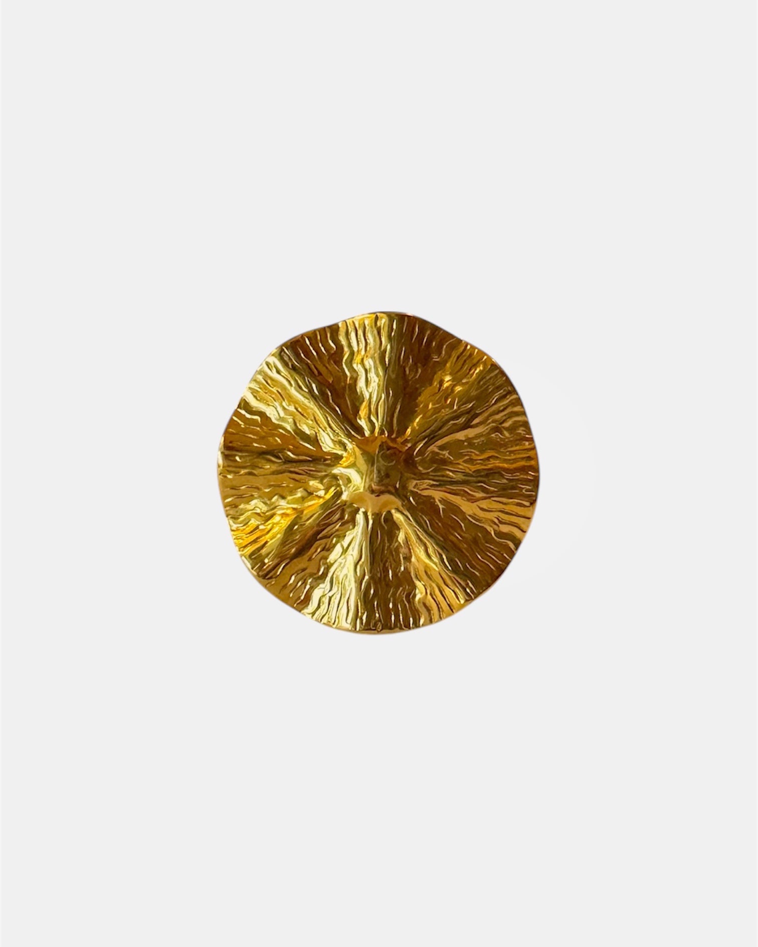 Gold ring with textured surface design