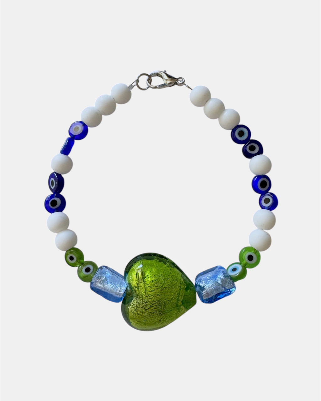green bracelet with glass heart and evil eye beads, handmade jewelry piece for women and girls