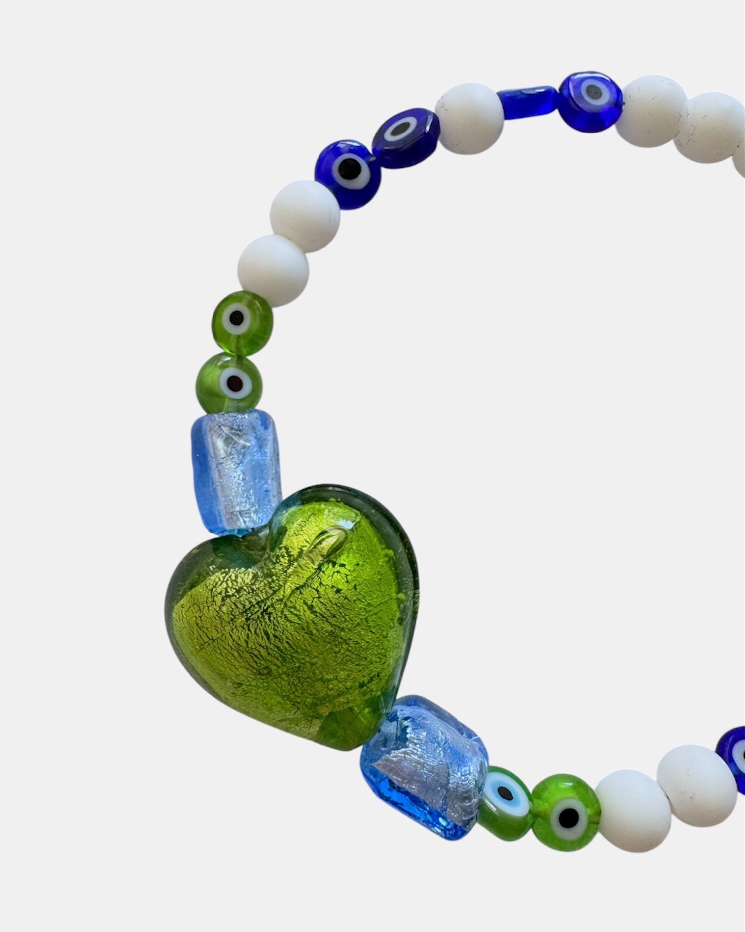 green bracelet with glass heart and evil eye beads, handmade jewelry piece for women and girls
