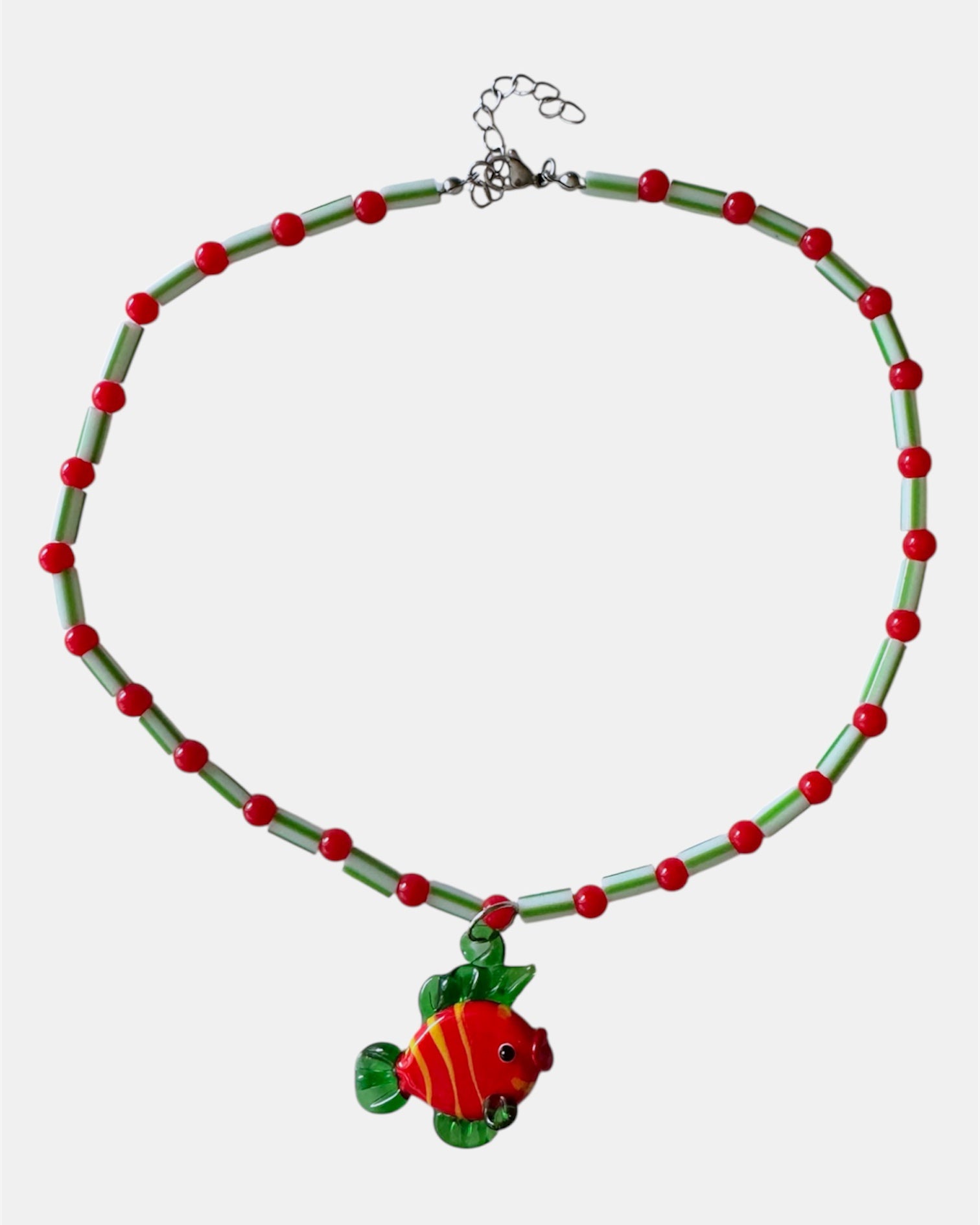 green and red necklace with glass beads and fish charm, handmade jewelry piece for women and girls