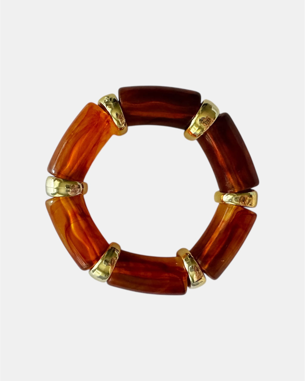 Γυναικείο βραχιόλι σε κεχριμπαρένια απόχρωση με χρυσές λεπτομέρειες