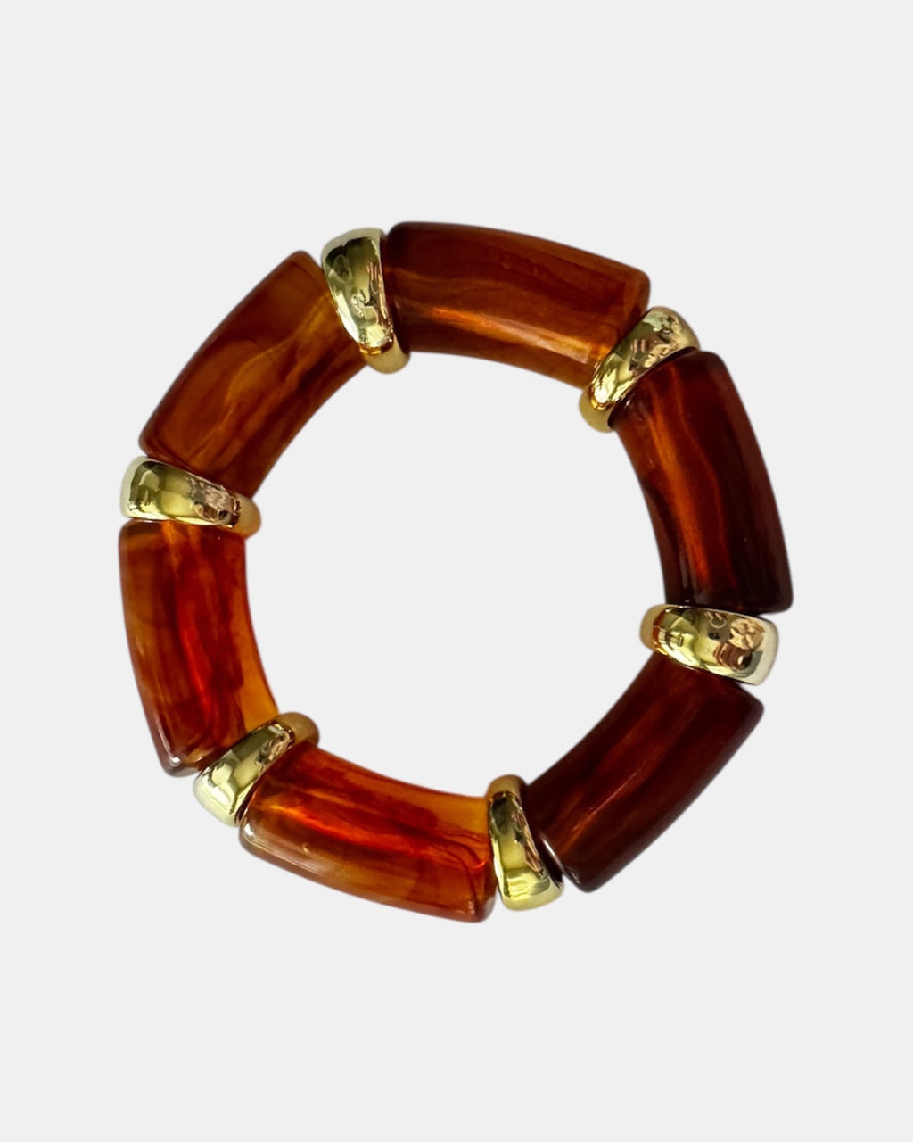 Γυναικείο βραχιόλι σε κεχριμπαρένια απόχρωση με χρυσές λεπτομέρειες