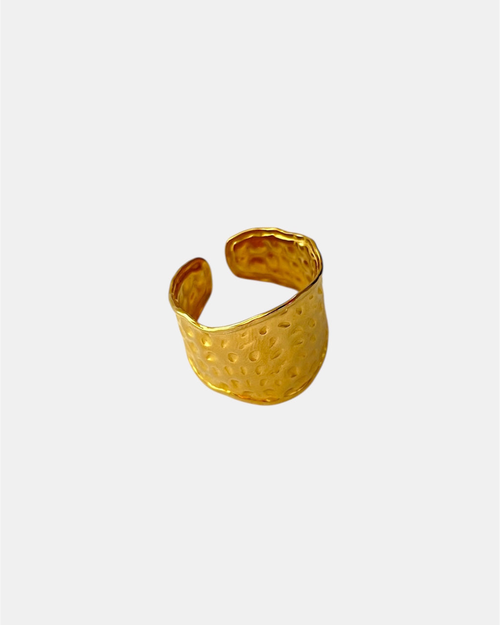 Hammered gold ring with textured finish