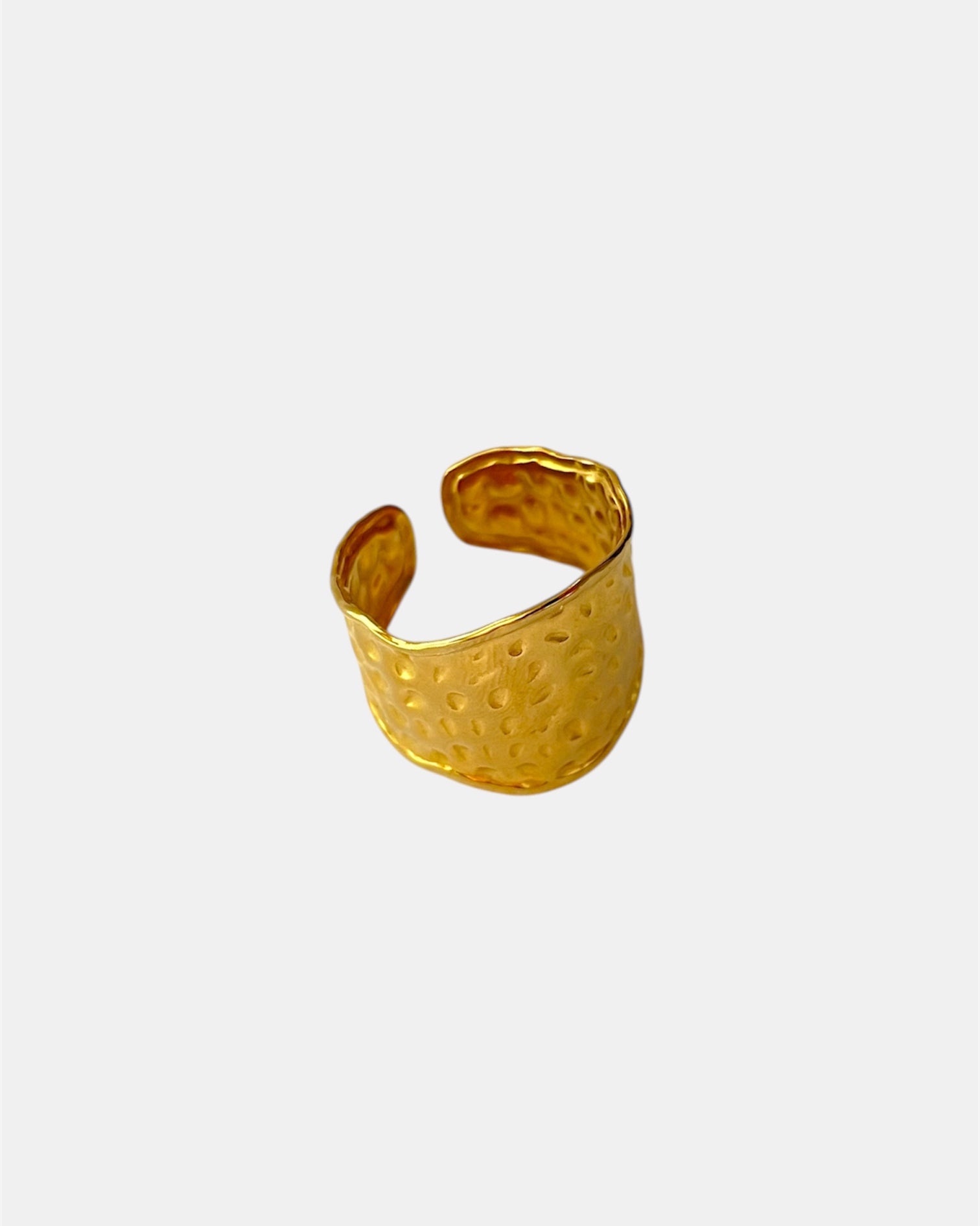 Hammered gold ring with textured finish