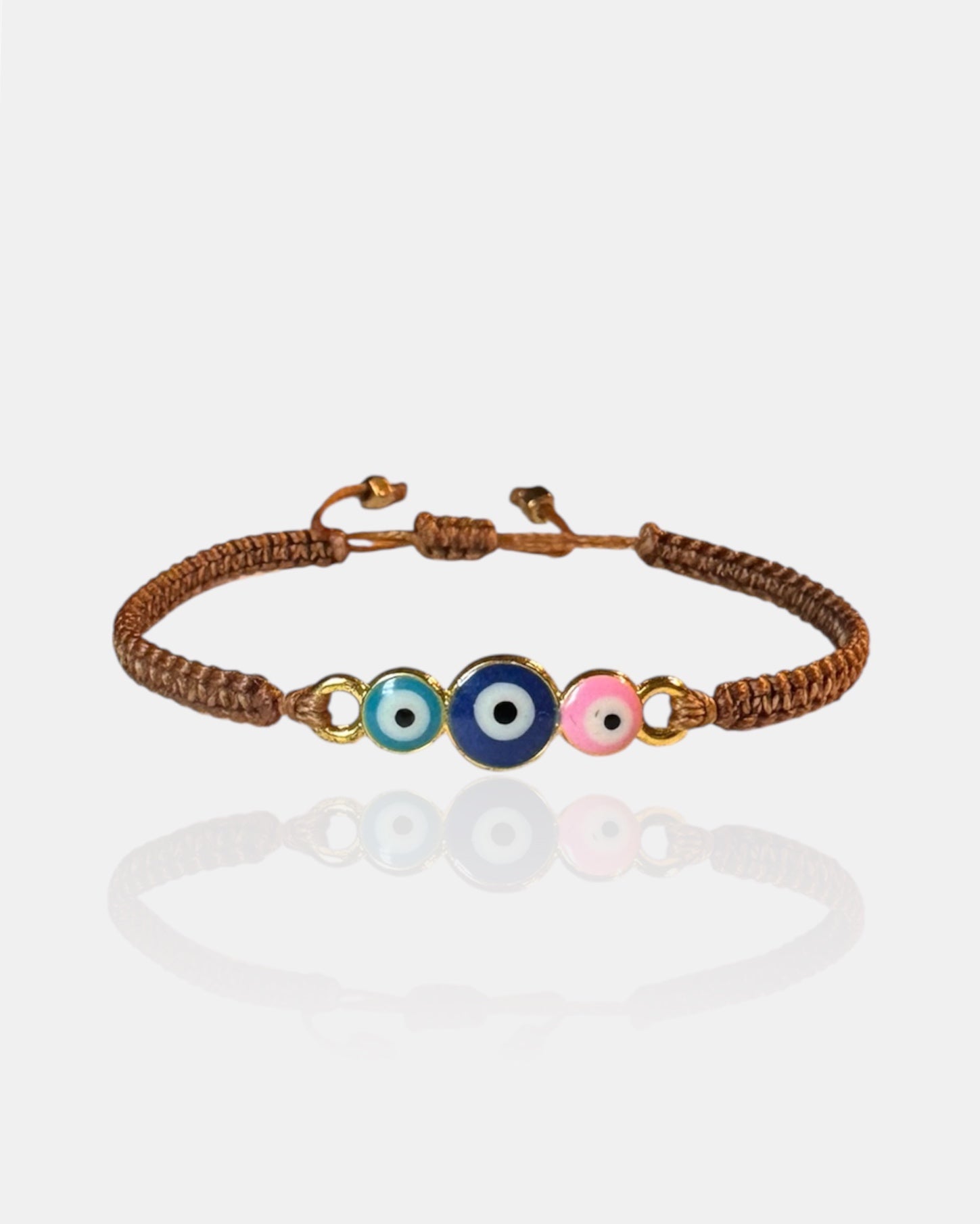 Καφέ παιδικό μακραμέ βραχιόλι με πολύχρωμα ματάκια, χειροποίητο παιδικό κόσμημα.