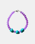 Lilac bracelet decorated with glass beads and turquoise stones for a colorful, bohemian style