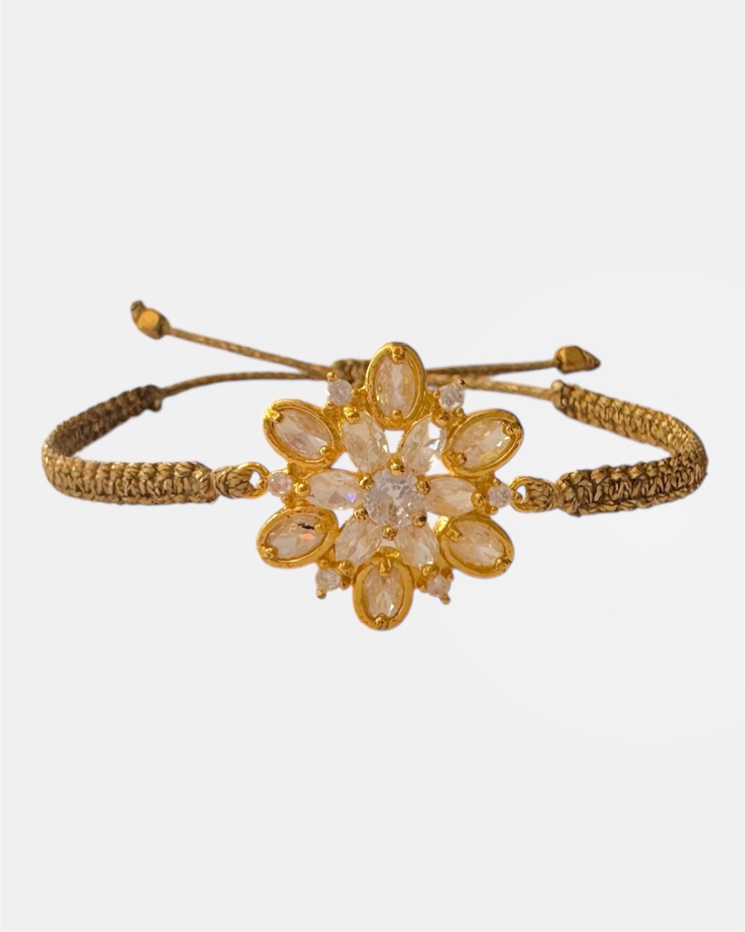 Macrame bracelet with gold flower charm